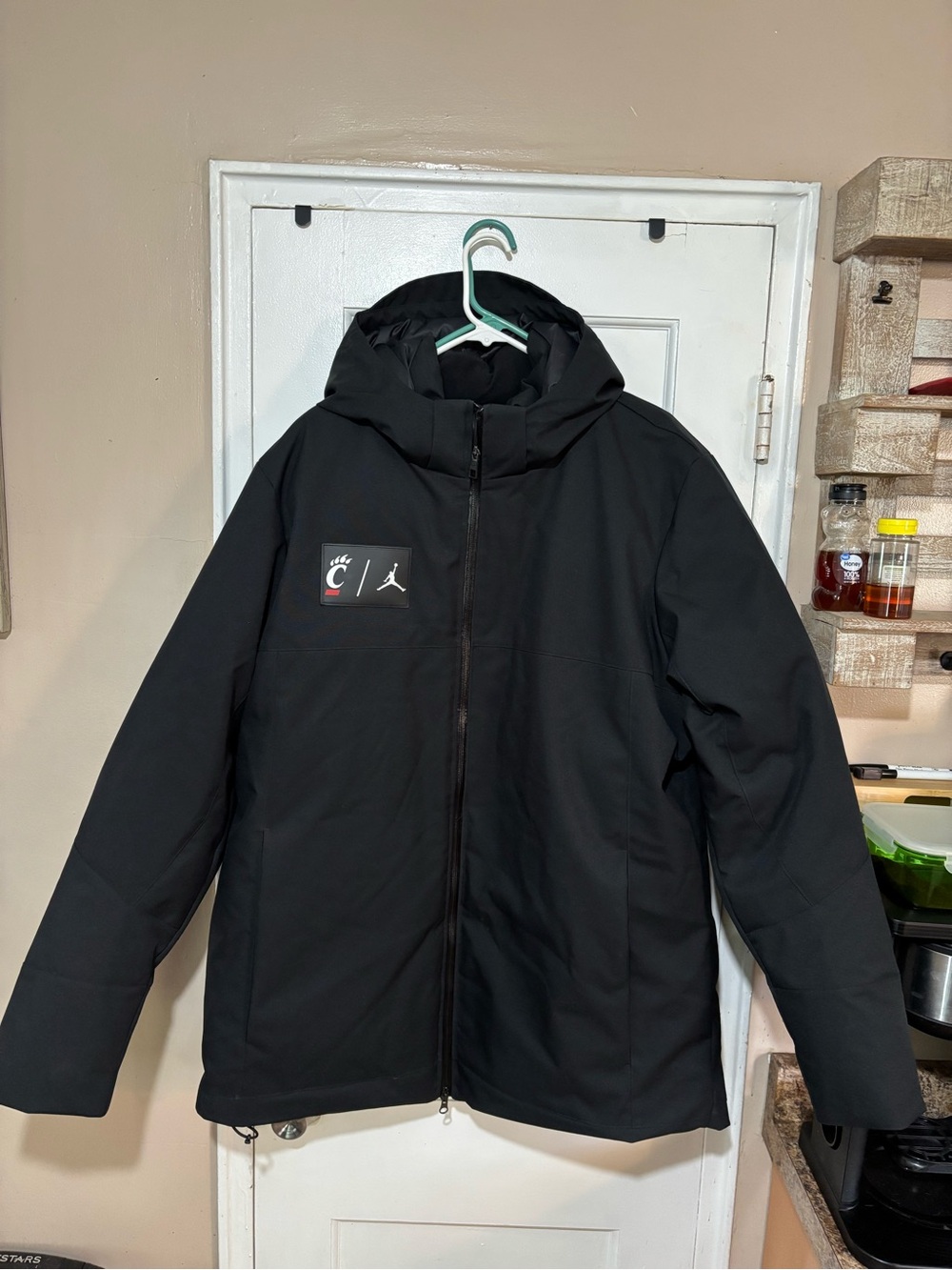 Jordan x Cincinnati Black Hooded Puffer Jacket Men’s.